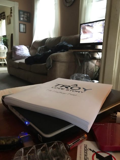 Manuscript on a coffee table.